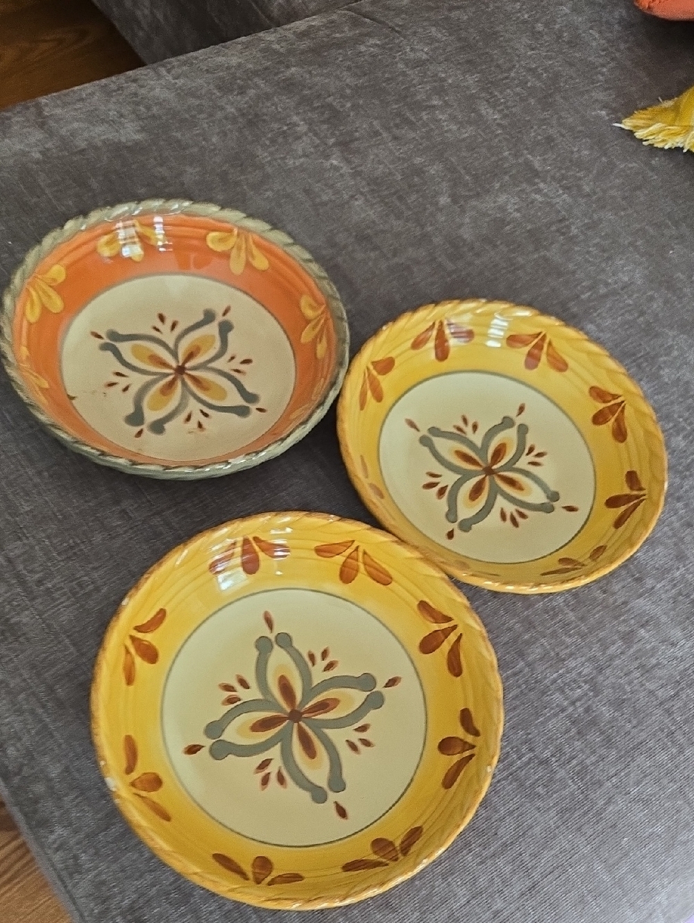 Set of (3) Artimino Tuscan Countryside Sienna Yellow stoneware coupe bowls,